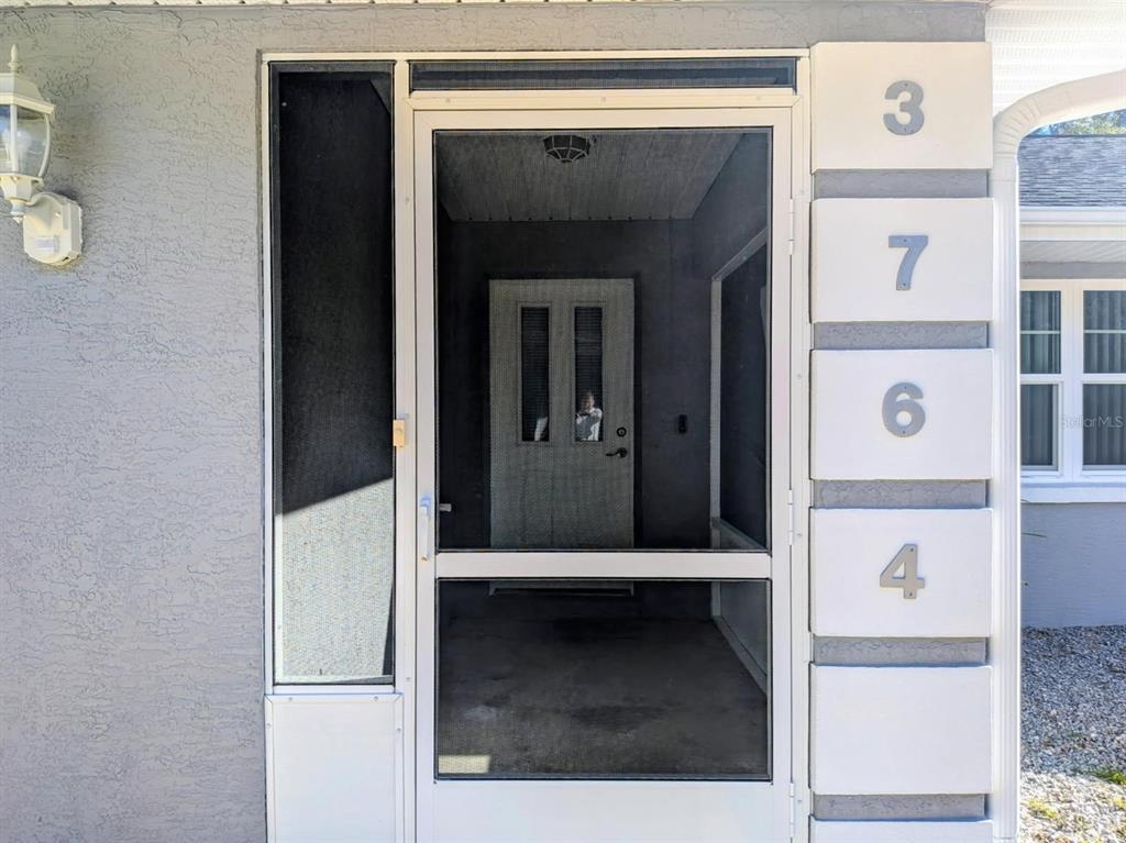 3764 East Sanders Street Inverness, FL 34453 - Photo 4 of 39 a view of front door