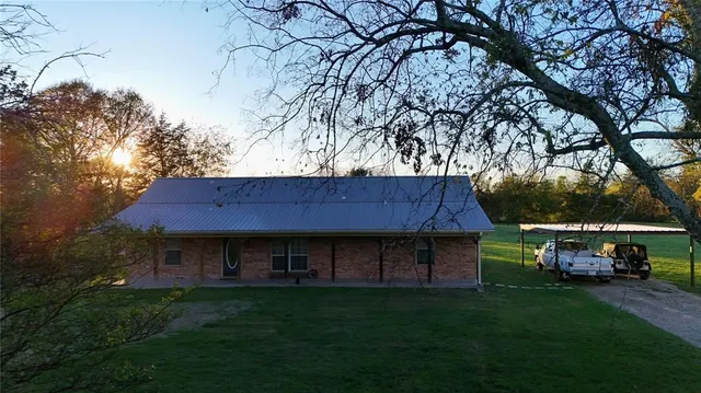 a house view with a garden space