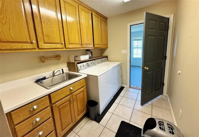 a view of a livingroom with furniture and a flat screen tv