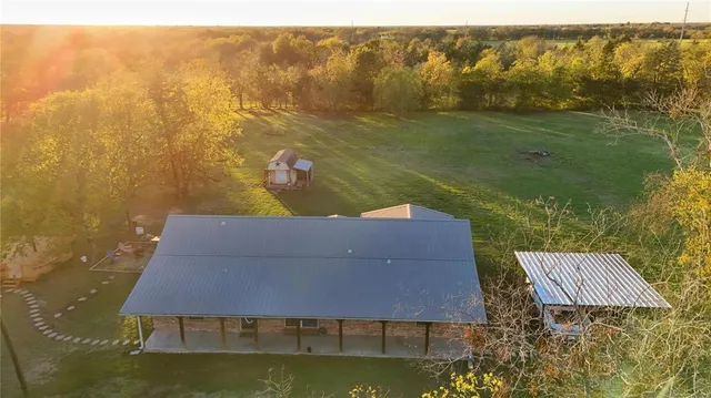 a view of a lake with a yard