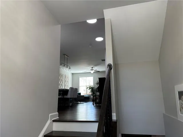 a view of living room with furniture and flat screen tv