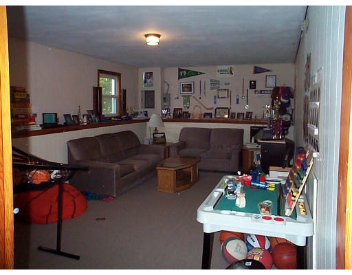8 Patricia Road Billerica, MA 01821 - Photo 4 of 8 a living room with furniture and a dining table