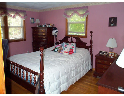 8 Patricia Road Billerica, MA 01821 - Photo 5 of 8 a bedroom with a bed and a dresser