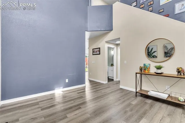 a view of a livingroom with wooden floor
