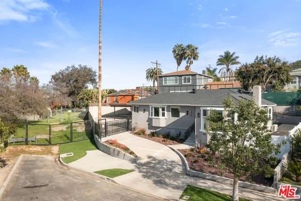 a view of a house with a park