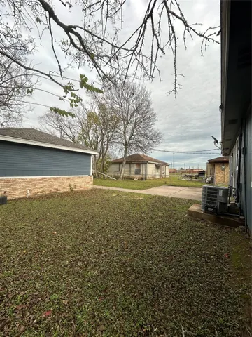 a view of a big yard next to a building
