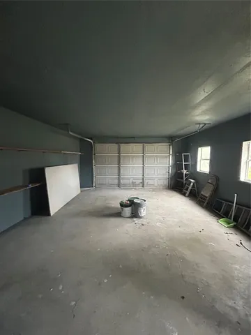 a view of a livingroom with furniture and window