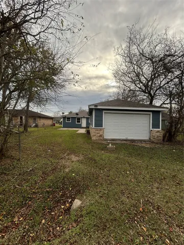 a backyard of a house with lots of green space
