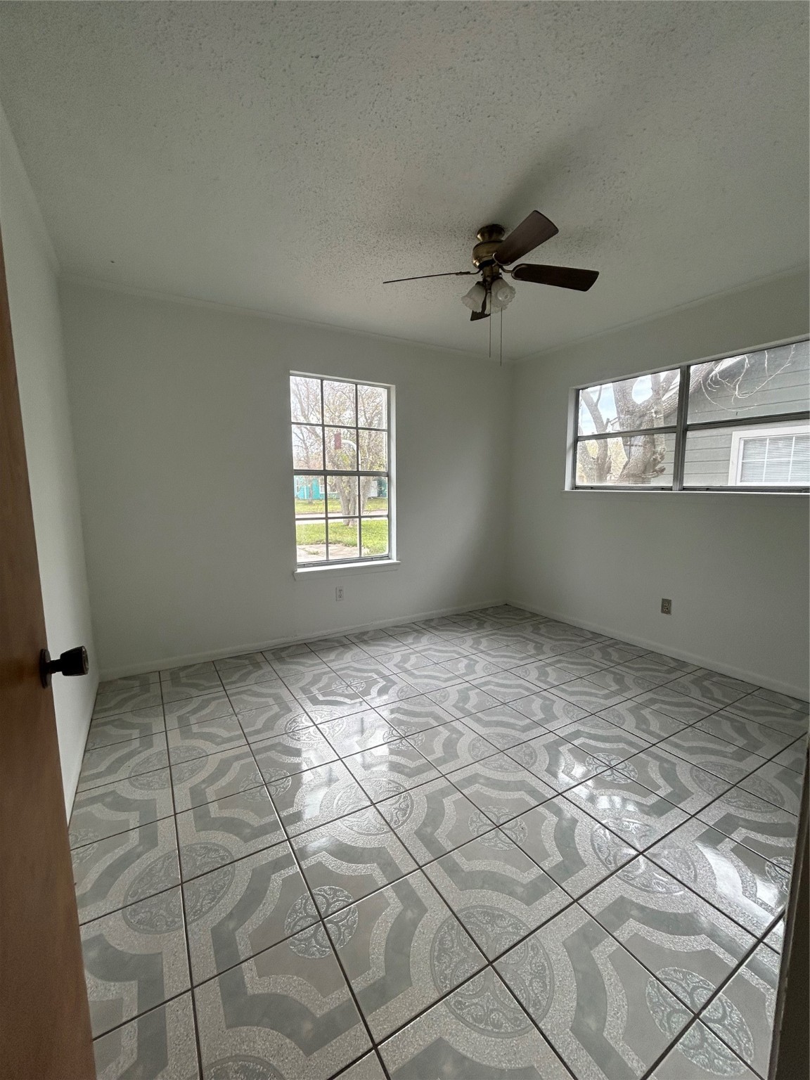 1710 North Avenue H Freeport, TX 77541 - Photo 8 of 17 a view of an empty room with a window