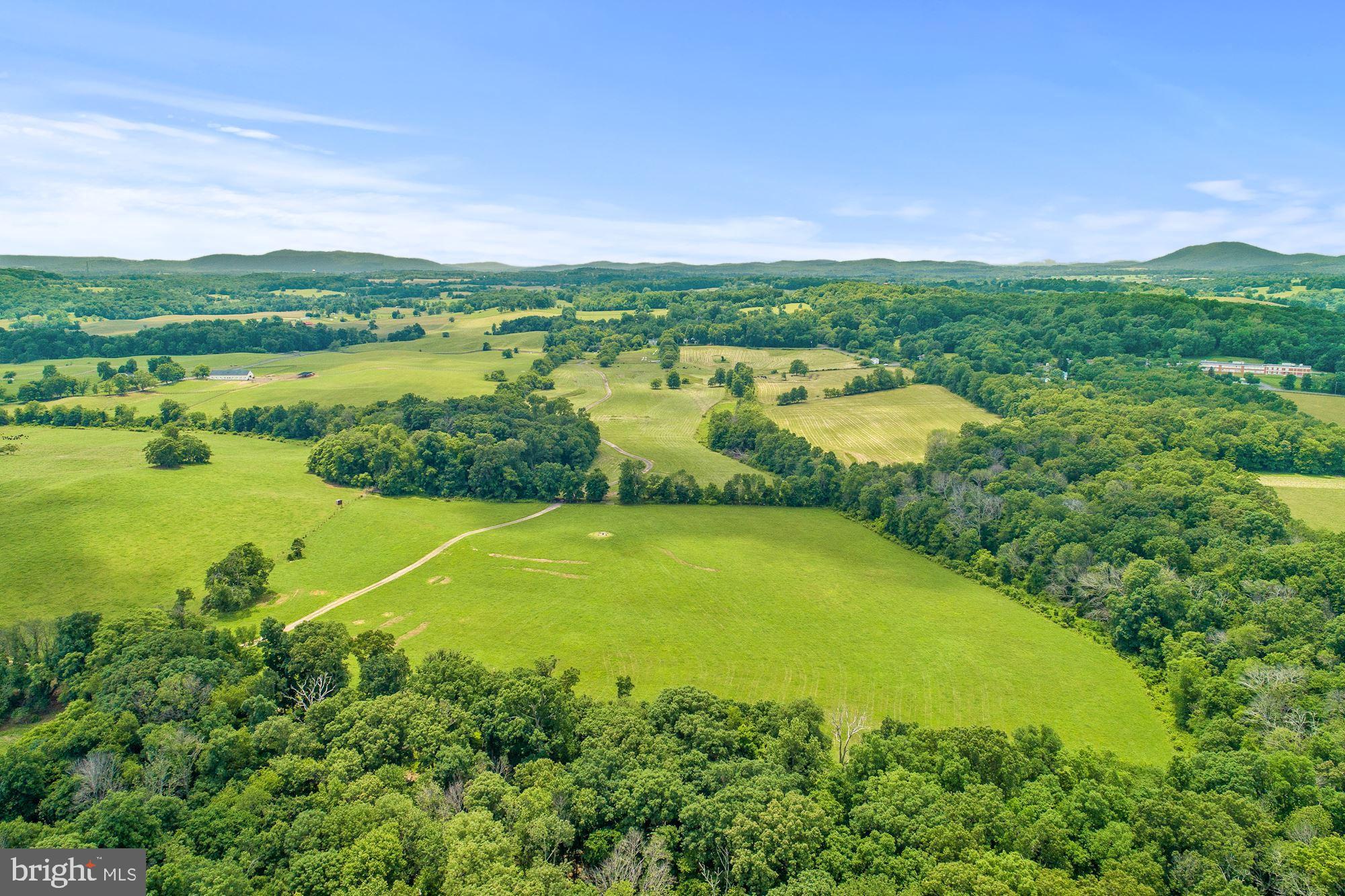8160 Frogtown Road Marshall, VA 20115 - Photo 3 of 34 a view of a lake with a city