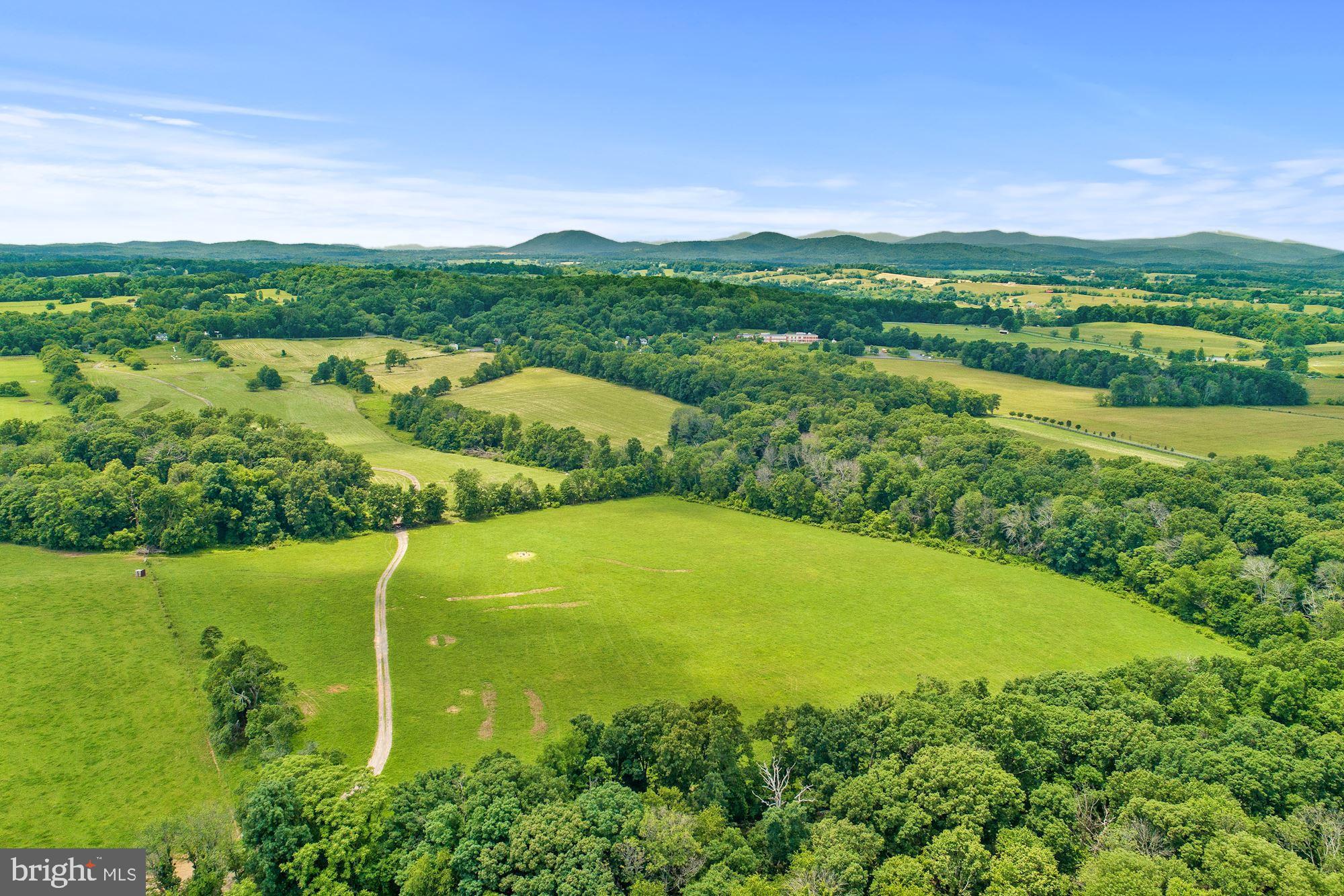 8160 Frogtown Road Marshall, VA 20115 - Photo 4 of 34 a view of a lake with a city