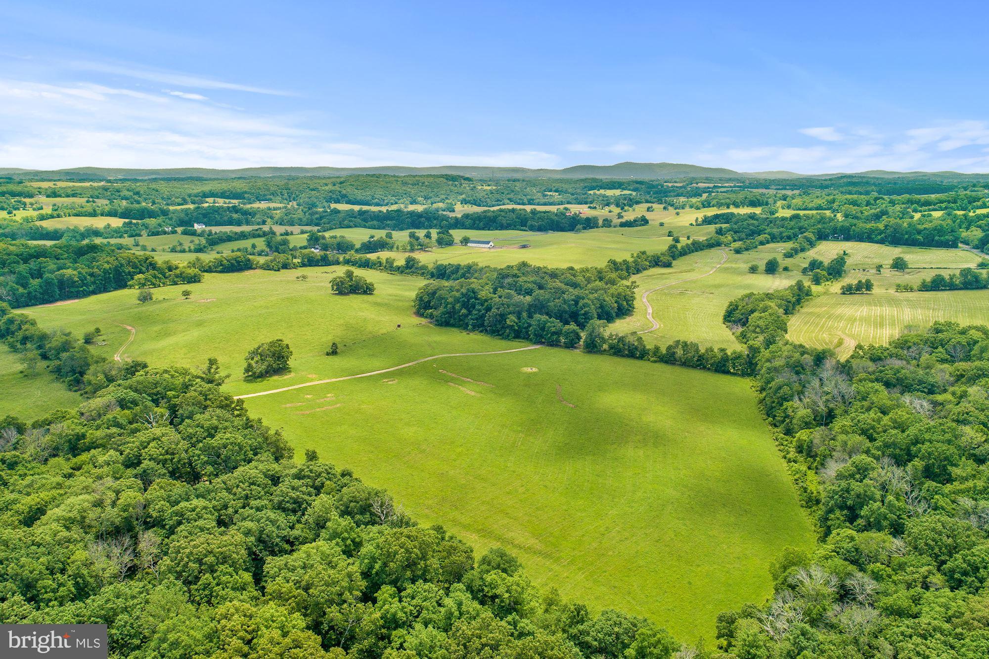 8160 Frogtown Road Marshall, VA 20115 - Photo 8 of 34 a view of a lake with a city