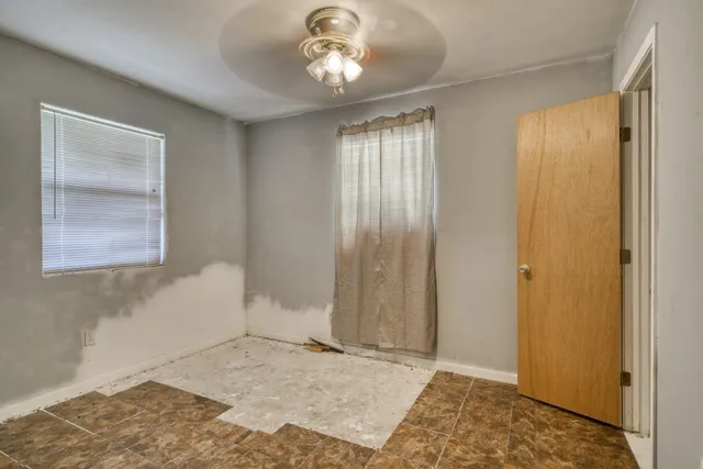 a view of an empty room and window