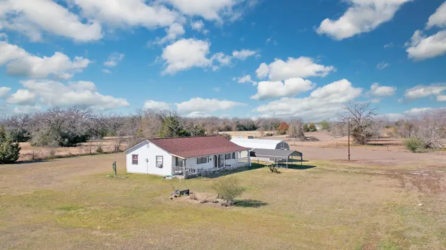 a view of a town with big house