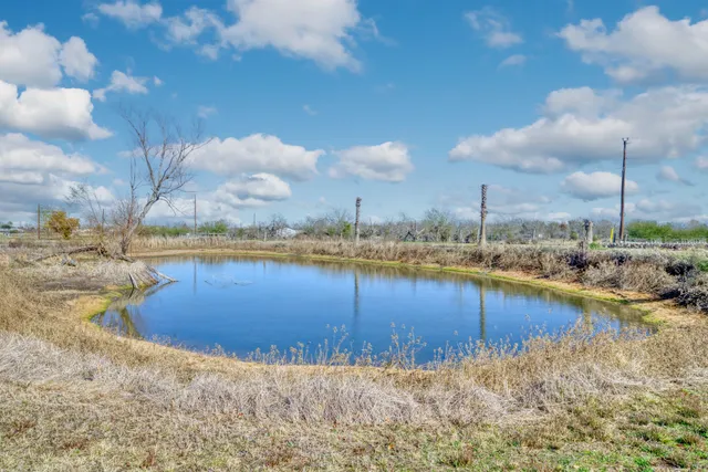 a view of a lake with a house