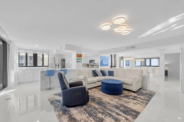 a view of living room kitchen