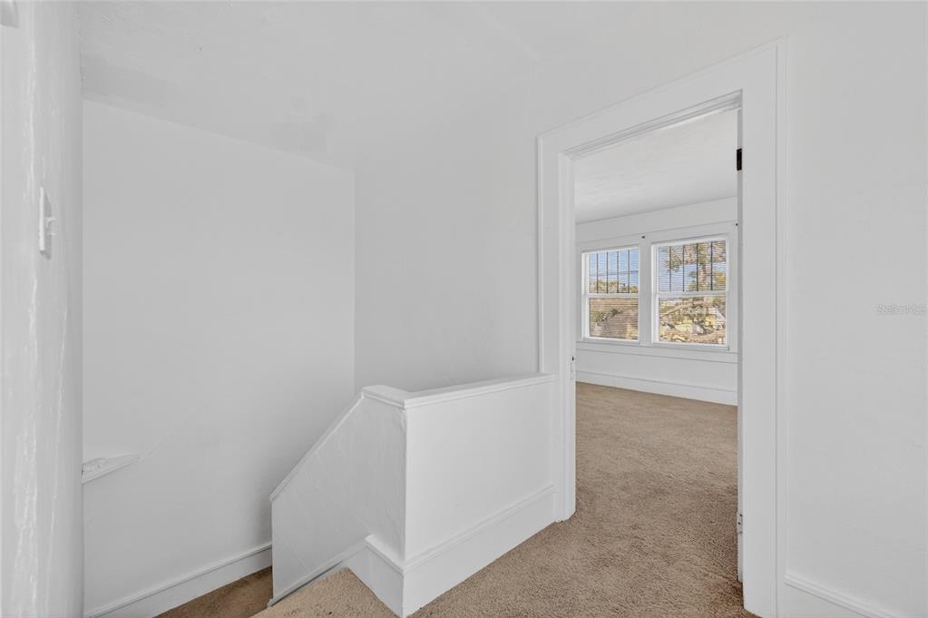 1616 Cres Ridge Road Daytona Beach, FL 32118 - Photo 18 of 40 an entryway with a workspace