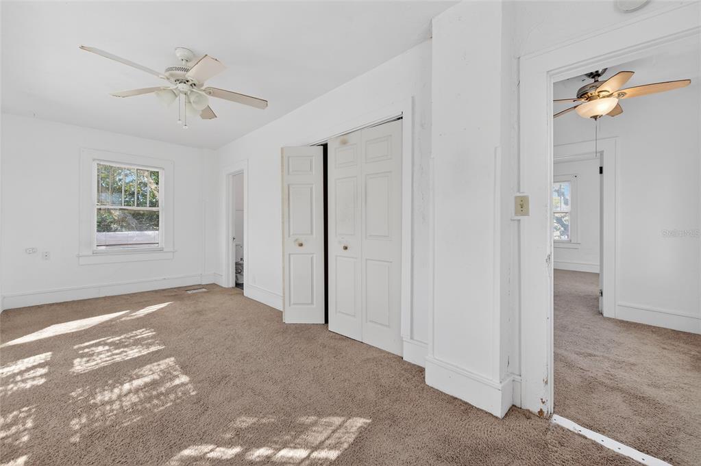 1616 Cres Ridge Road Daytona Beach, FL 32118 - Photo 22 of 40 a view of a livingroom with a ceiling fan and window