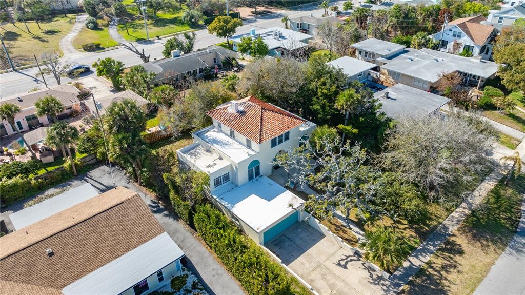 1616 Cres Ridge Road Daytona Beach, FL 32118 - Photo 24 of 40 an aerial view of a house with a yard