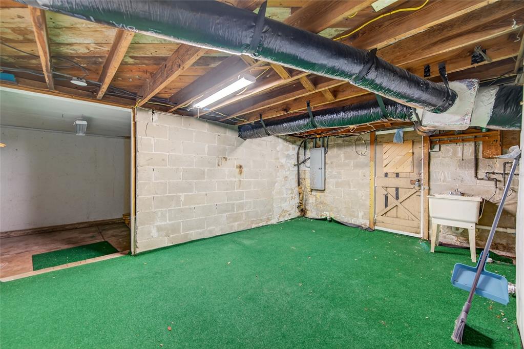 1616 Cres Ridge Road Daytona Beach, FL 32118 - Photo 36 of 40 a view of an empty room with stairs