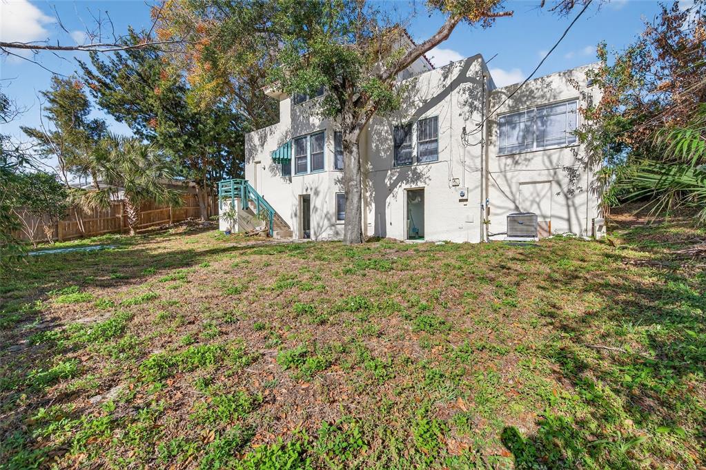 1616 Cres Ridge Road Daytona Beach, FL 32118 - Photo 5 of 40 a big yard with large trees