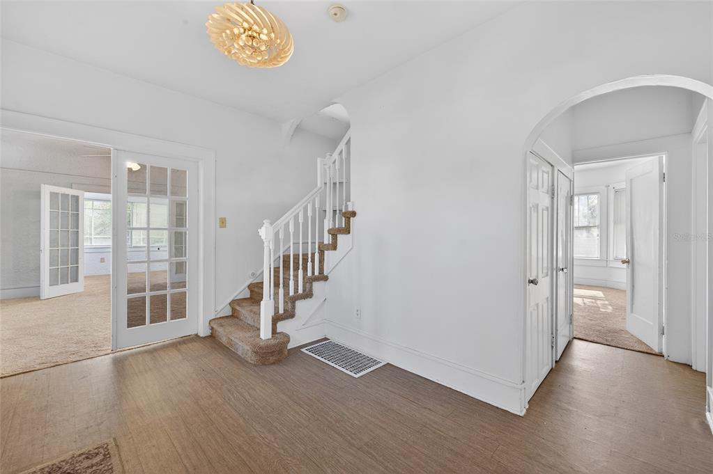 1616 Cres Ridge Road Daytona Beach, FL 32118 - Photo 7 of 40 a view of an entryway with wooden floor