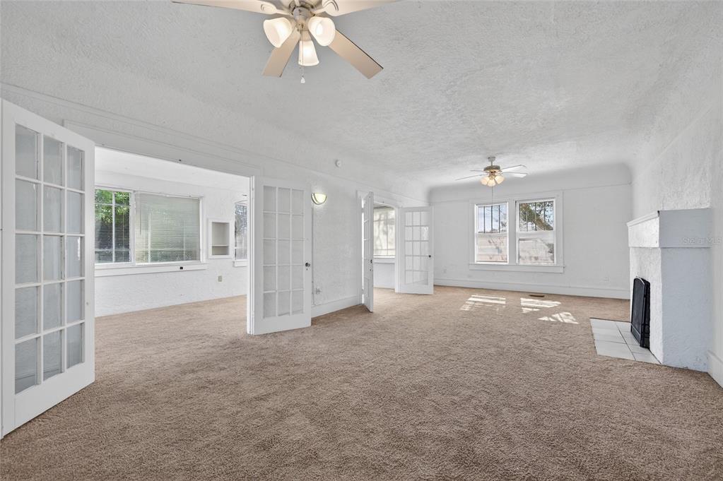 1616 Cres Ridge Road Daytona Beach, FL 32118 - Photo 8 of 40 a view of an empty room with a window