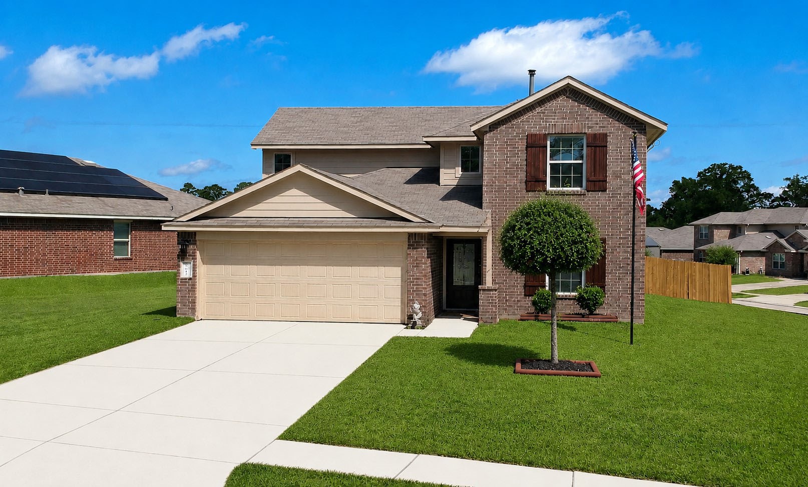 5612 Rainflower Terrace Lane Spring, TX 77389 - Photo 1 of 50 a front view of a house with a yard and garage
