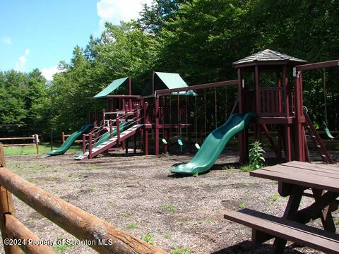 a view of a park with slide