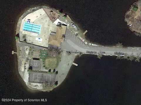 a view of swimming pool from a hallway