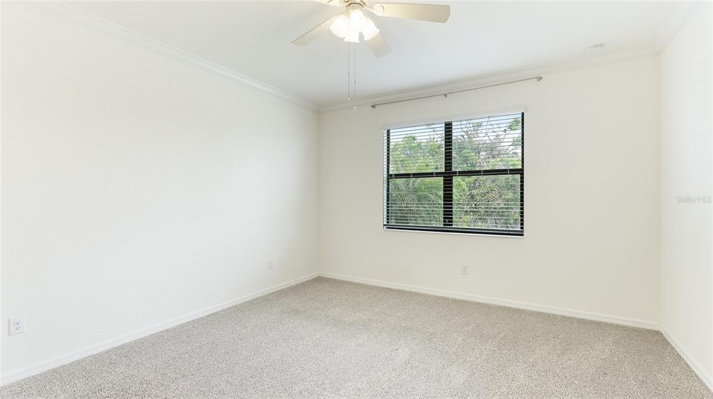 17311 Blue Ridge Place Bradenton, FL 34211 - Photo 14 of 55 an empty room with a window