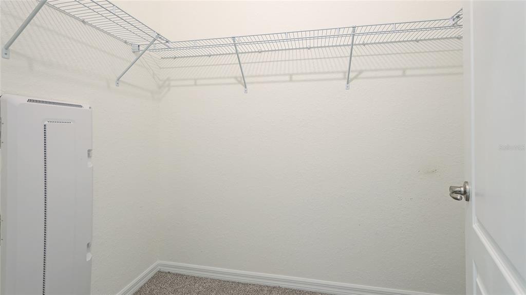 17311 Blue Ridge Place Bradenton, FL 34211 - Photo 18 of 55 a view of a room with racks on the wall
