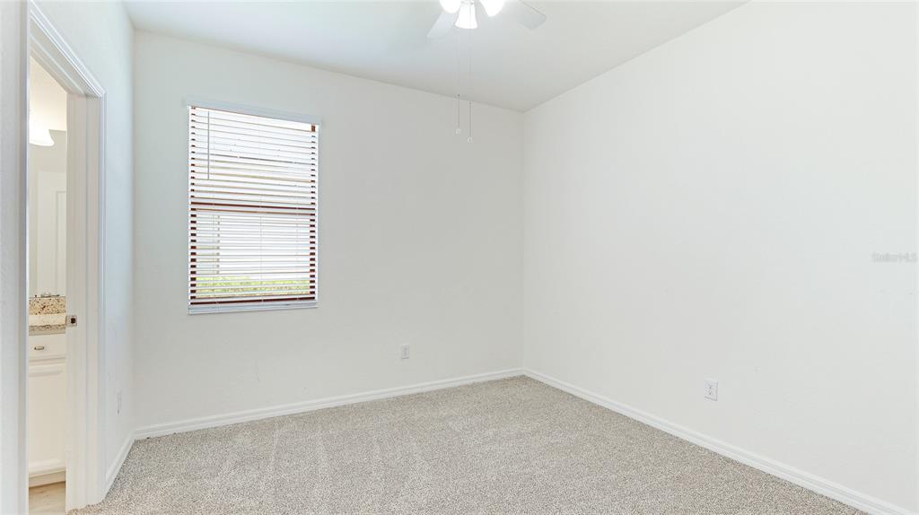 17311 Blue Ridge Place Bradenton, FL 34211 - Photo 21 of 55 an empty room with a window