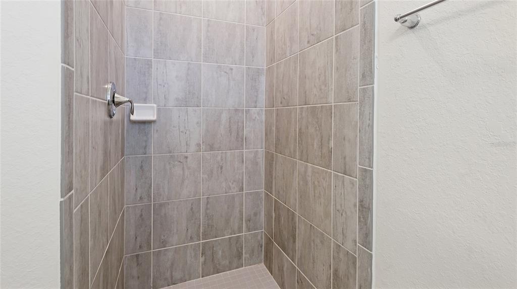 17311 Blue Ridge Place Bradenton, FL 34211 - Photo 24 of 55 a bathroom with a shower