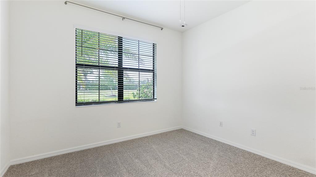 17311 Blue Ridge Place Bradenton, FL 34211 - Photo 28 of 55 a view of an empty room with a window