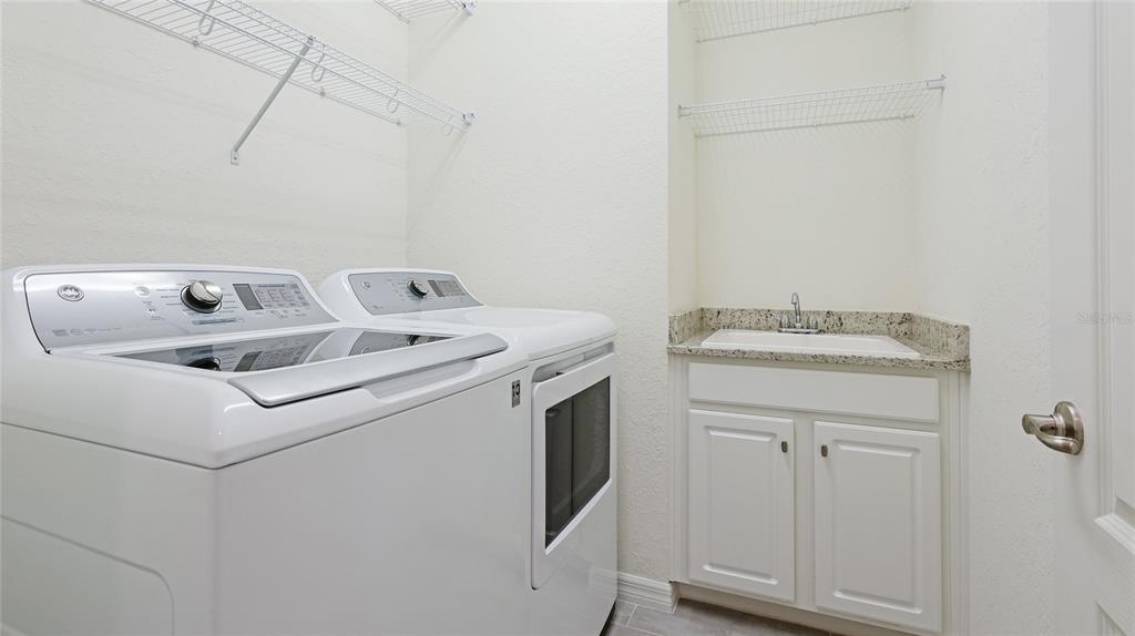 17311 Blue Ridge Place Bradenton, FL 34211 - Photo 31 of 55 a utility room with dryer and washer