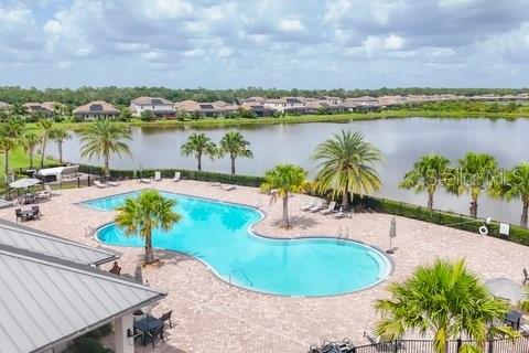 17311 Blue Ridge Place Bradenton, FL 34211 - Photo 42 of 55 a view of a swimming pool and lake view