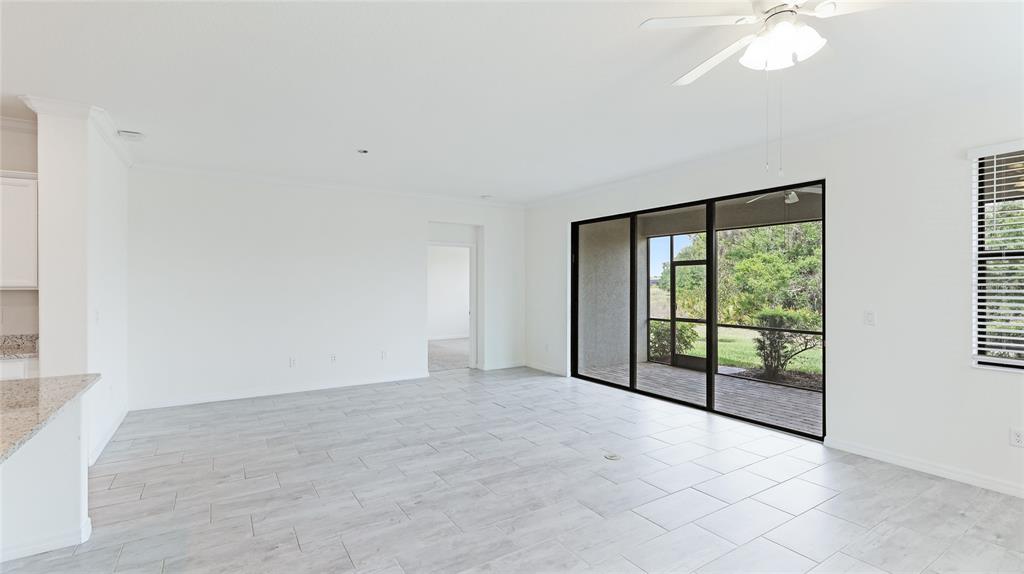 17311 Blue Ridge Place Bradenton, FL 34211 - Photo 10 of 55 a view of an empty room with a window