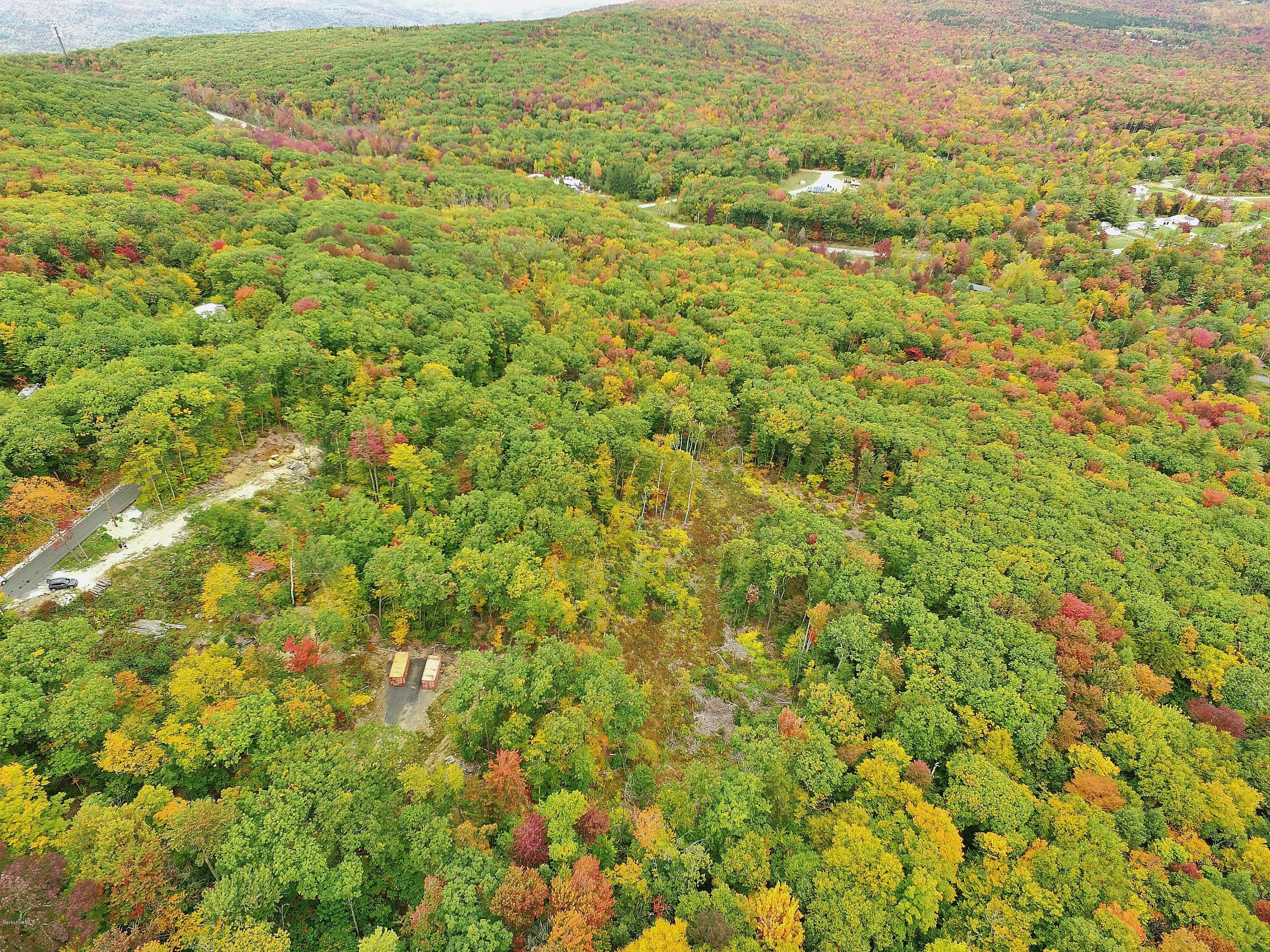 51 Strykers Road Florida, MA 01247 - Photo 22 of 44 a view of a city with lush green forest