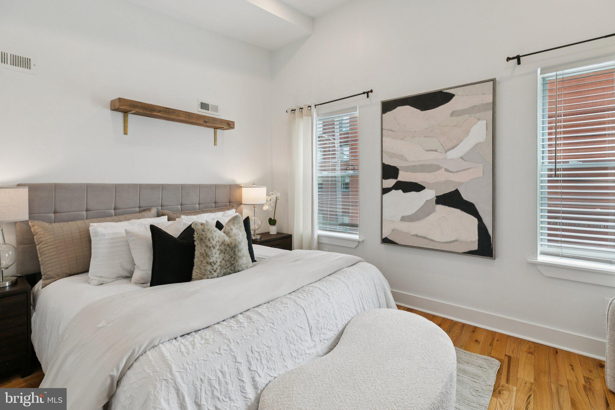 1537 Reed Street Philadelphia, PA 19146 - Photo 13 of 32 a bedroom with a bed and window