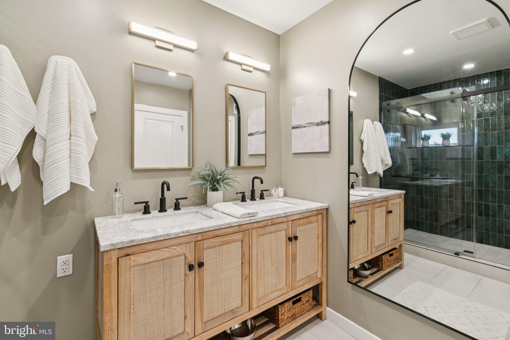1537 Reed Street Philadelphia, PA 19146 - Photo 18 of 32 a spacious bathroom with a double vanity sink mirror and double