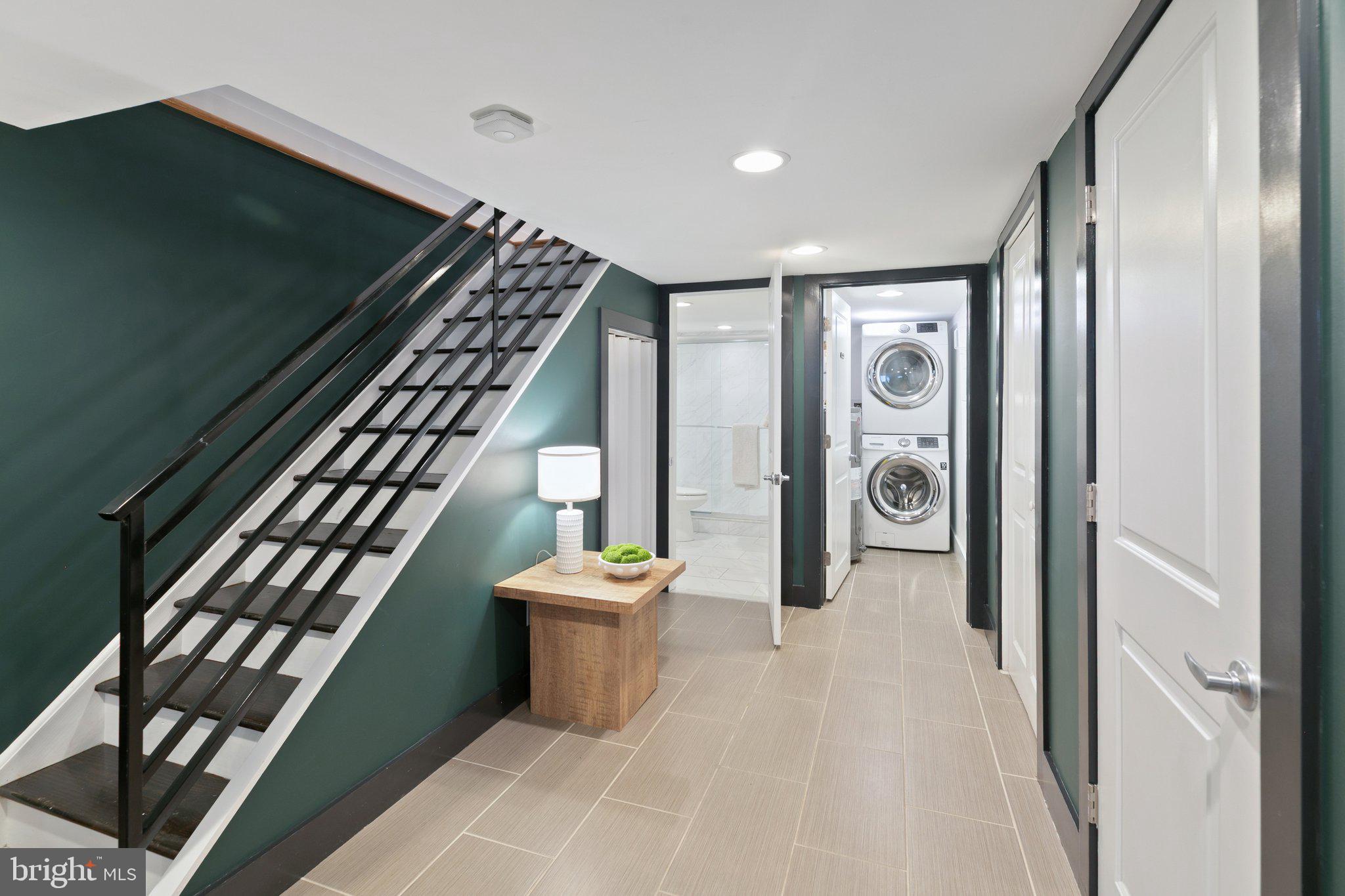 1537 Reed Street Philadelphia, PA 19146 - Photo 27 of 32 a entryway with stairs and furniture