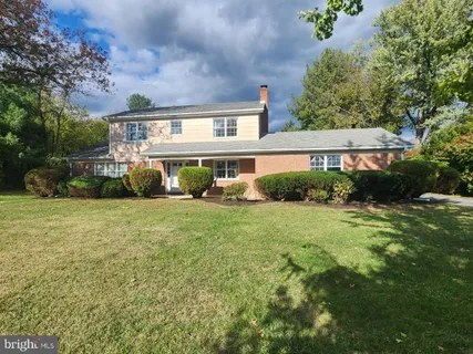 a house view with a garden space