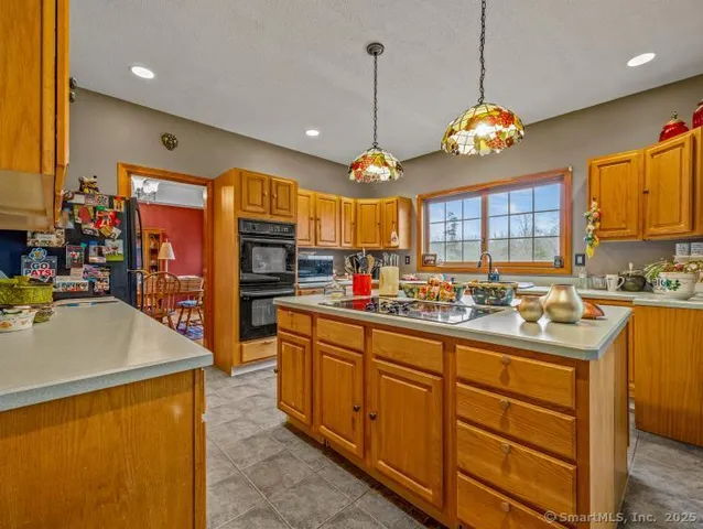 a bathroom with a sink a vanity and a mirror