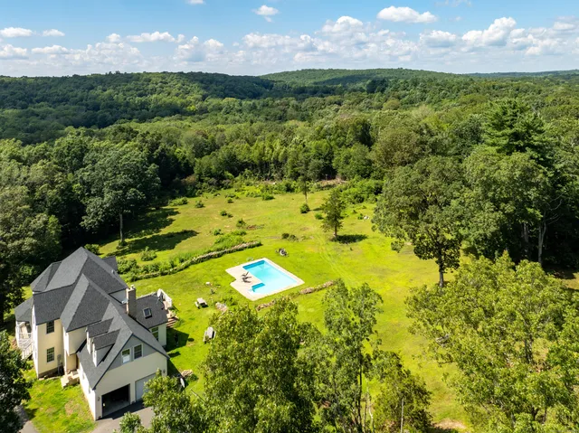 a view of a golf course with a garden