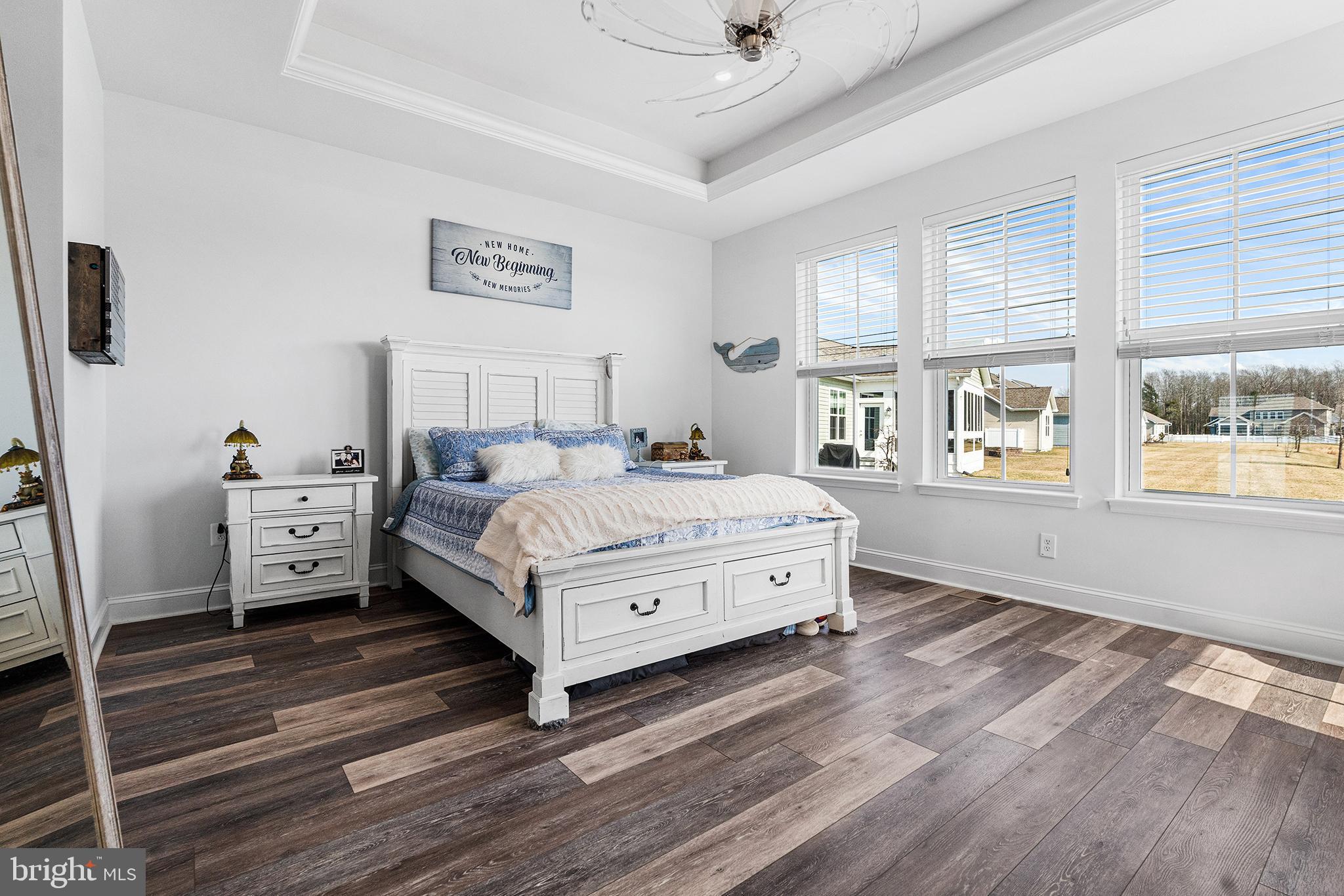 36207 Watch Hill Road Frankford, DE 19945 - Photo 13 of 35 a bedroom with a bed and wooden floor