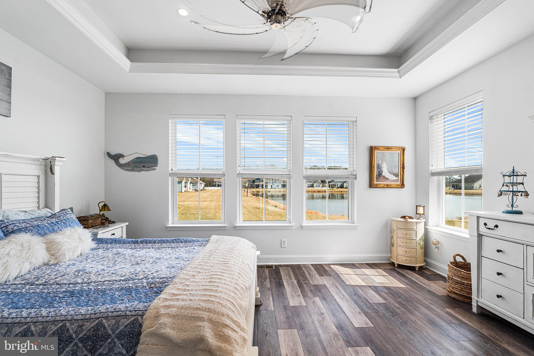 36207 Watch Hill Road Frankford, DE 19945 - Photo 15 of 35 a bedroom with a bed and wooden floor