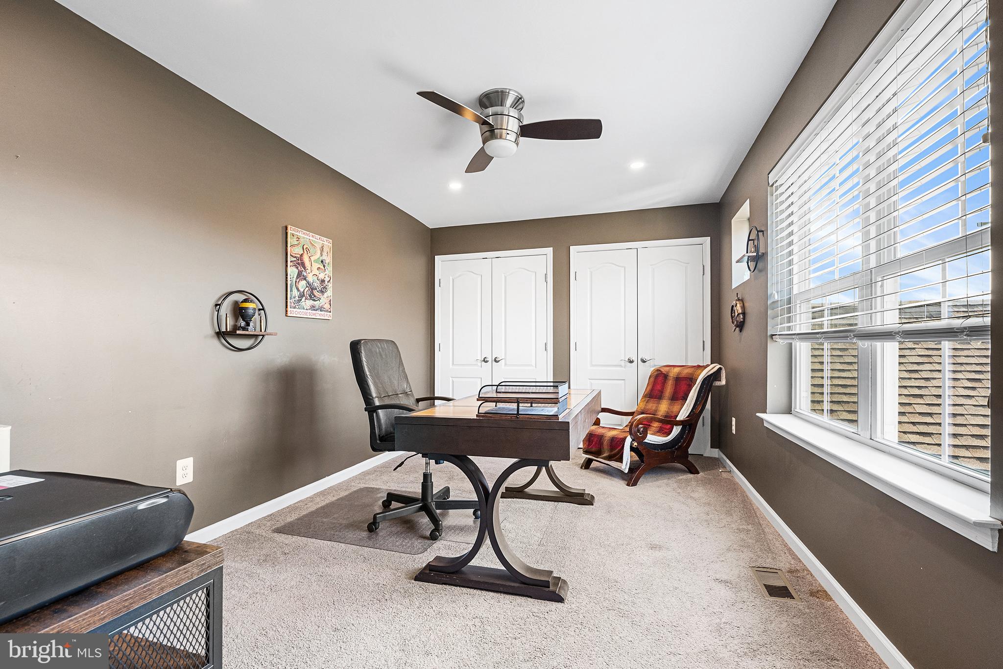 36207 Watch Hill Road Frankford, DE 19945 - Photo 21 of 35 a view of a workspace with furniture and a window