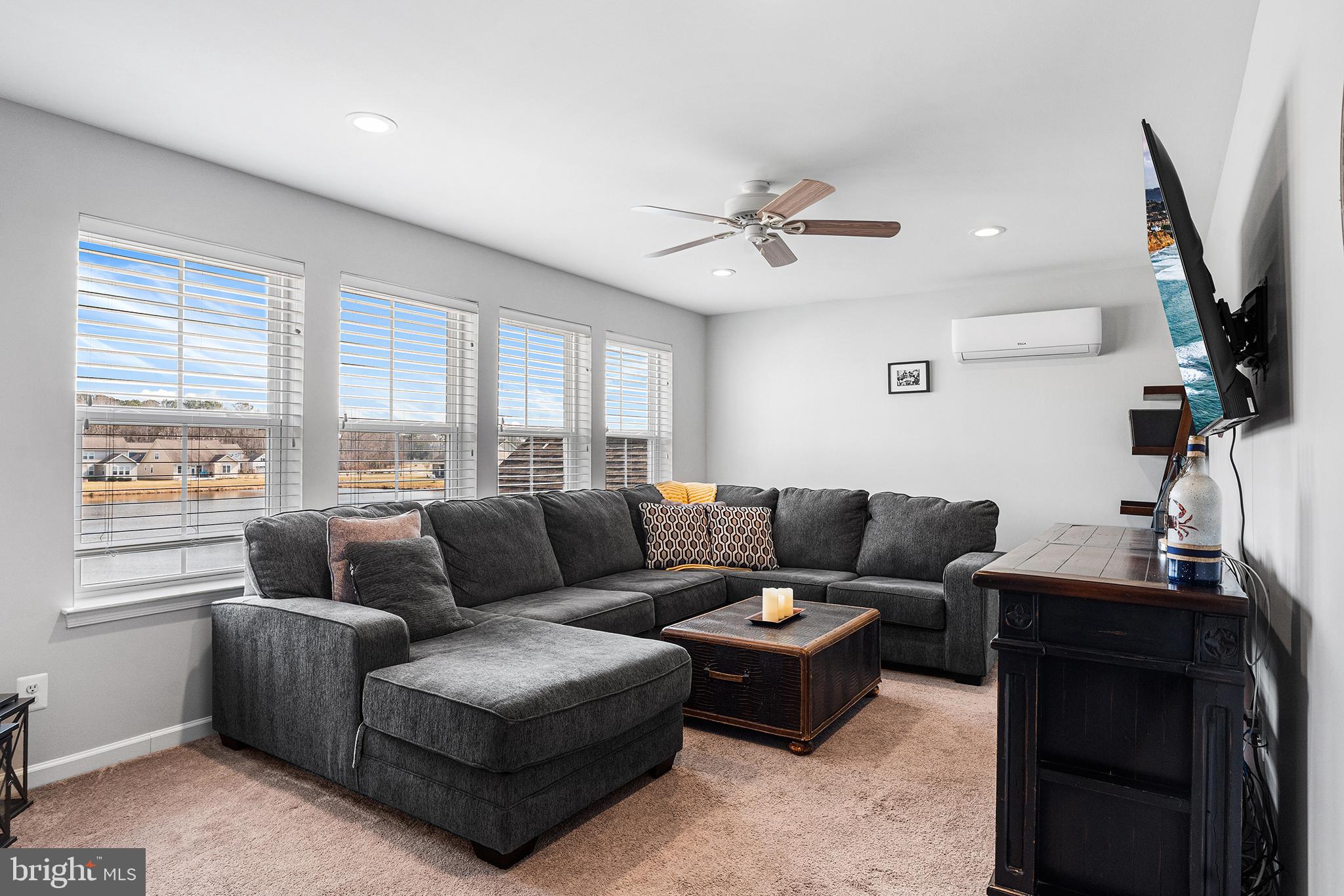 36207 Watch Hill Road Frankford, DE 19945 - Photo 26 of 35 a living room with furniture ceiling fan and a window