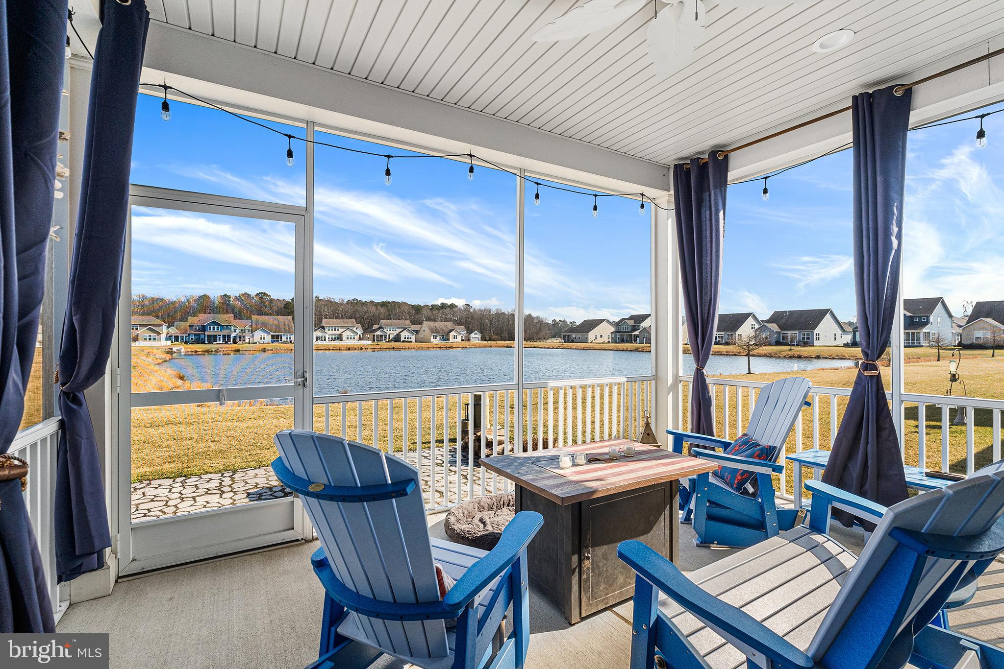 36207 Watch Hill Road Frankford, DE 19945 - Photo 27 of 35 a view of a chairs and table in the balcony
